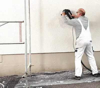 Broušení domovní zdi